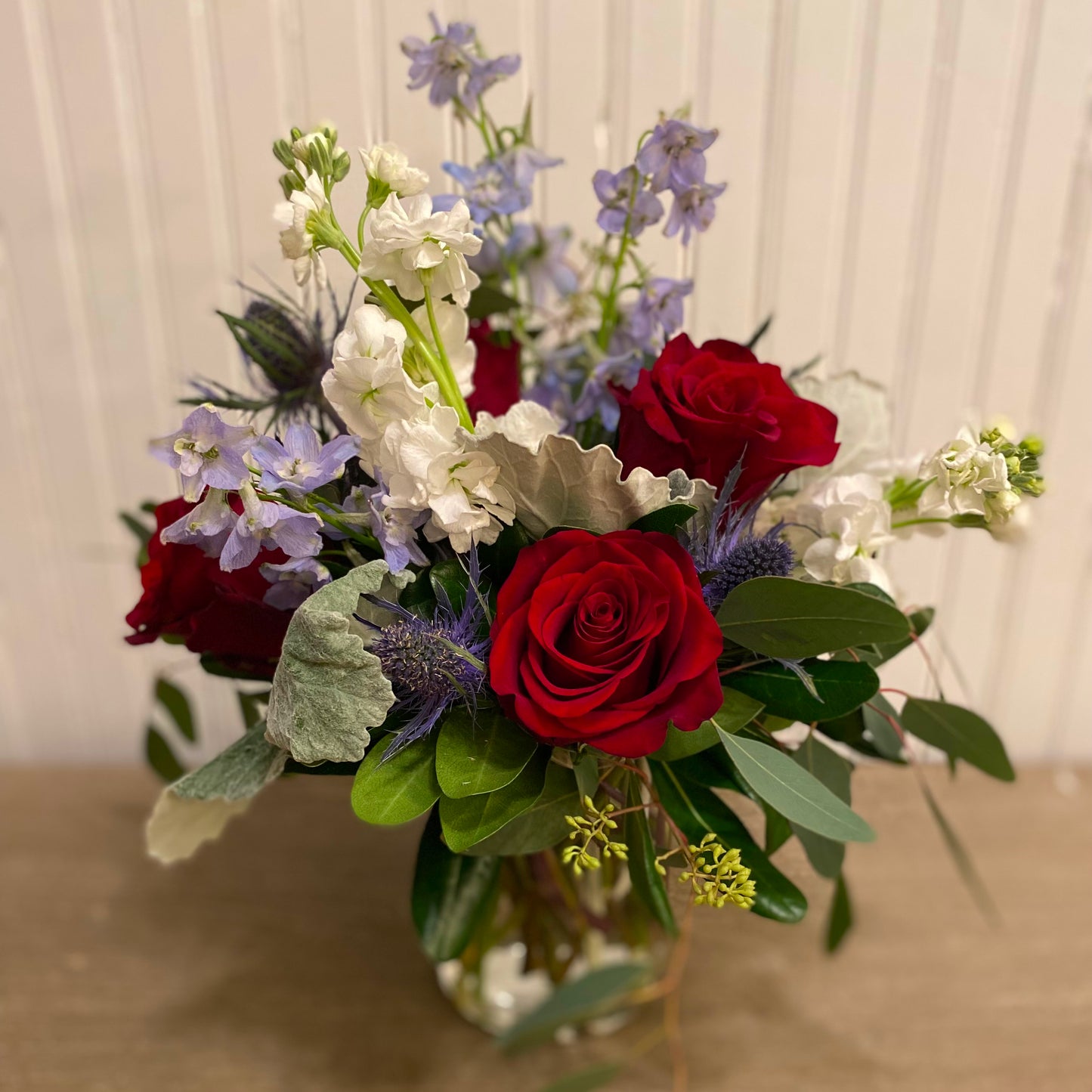 Delphinium, Roses, and Thistle Arrangement (Valentine's Day Pre-Order!)